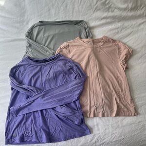 Three t-shirts - Lululemon x2, Smartwool x1